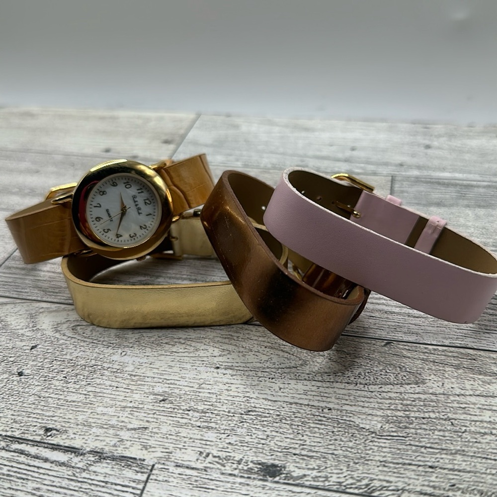 Peak and peck gold mother of pearl watch with interchangeable bands